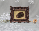 Small framed Cottontail Rabbit painting print in ornate frame, front view