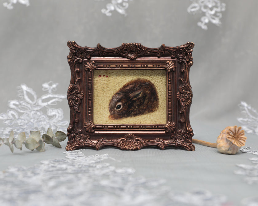 Small framed Cottontail Rabbit painting print in ornate frame, front view