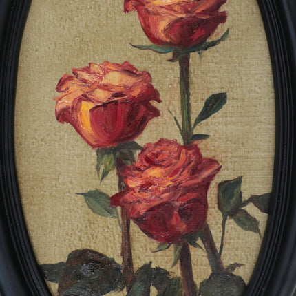 Original red roses oil painting in an ornate long oval gilt frame on cream linen, close up view