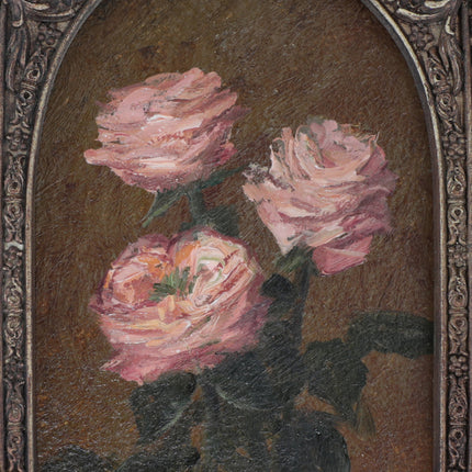 Close up of the original pink rose oil painting in arch gilt frame