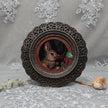 Framed bunny art print in ornate bronze frame standing, front view