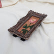 Original pink rose oil painting in an long narrow gilt frame on cream linen, side view