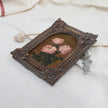 Original pink rose oil painting in arch gilt frame on cream linen, side view