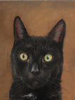 Close-up detail of a custom black cat oil painting, showing the textured brushwork on the face and green eyes