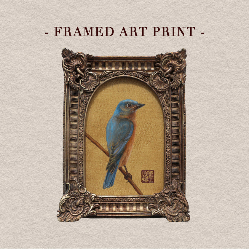 Framed bluebird art print with arch frame on beige background