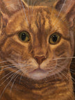 Close-up oil painting of an orange tabby cat with green eyes, detailed fur, and white whiskers.