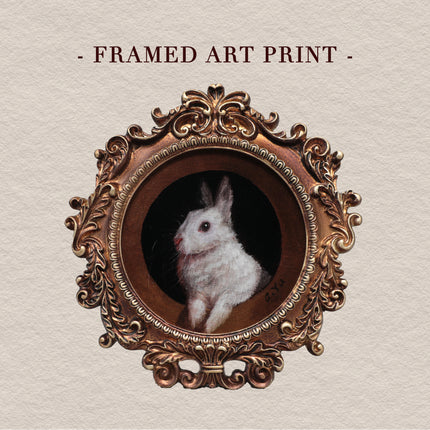 Framed bunny art print in round Baroque gilt frame