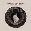 Framed bunny art print in round gilt frame