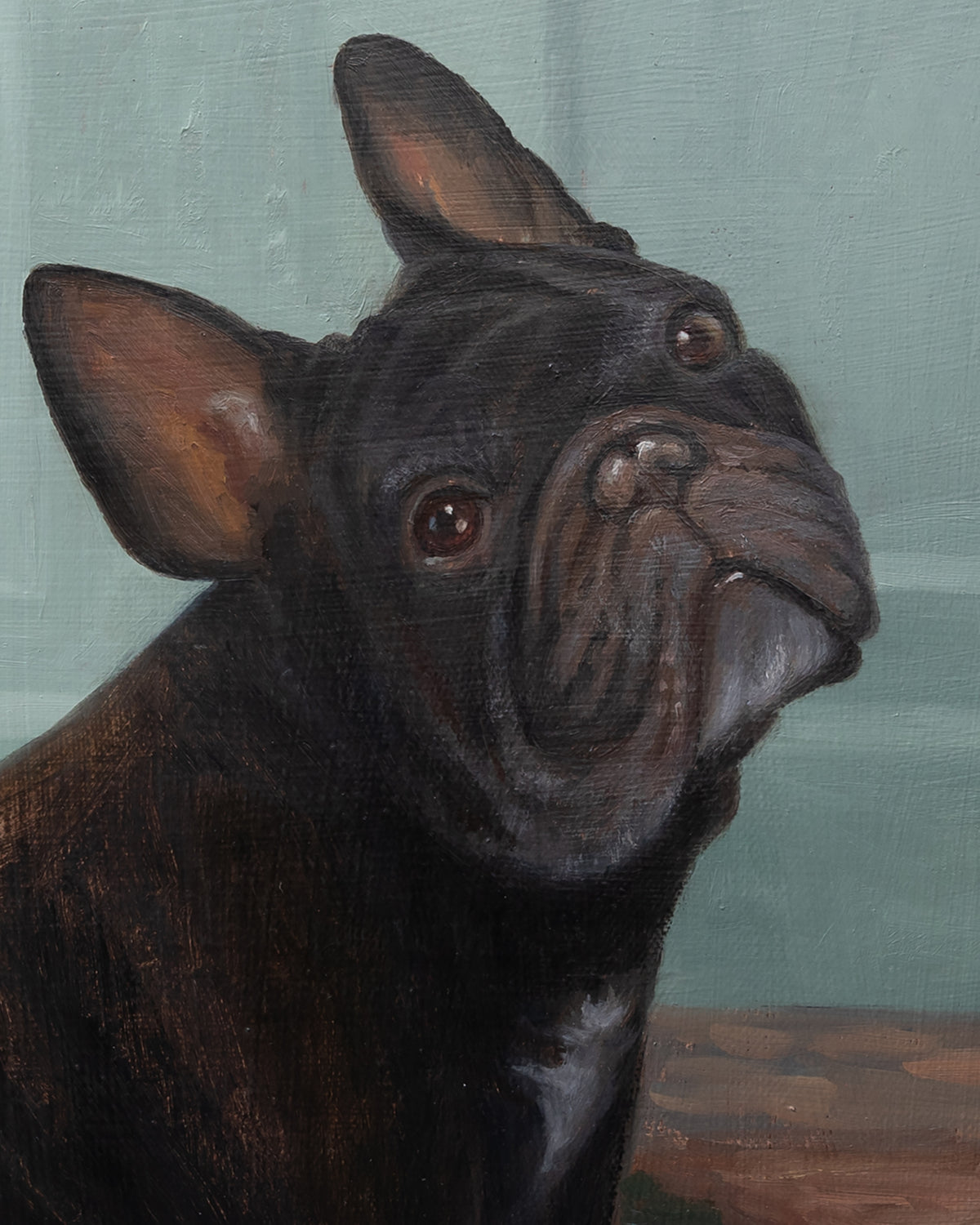 Close-up detail of a custom French bulldog oil painting, showing the textured brushwork on the face and ears