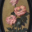 Close up of the original pink rose oil painting in an long oval gilt frame on cream linen