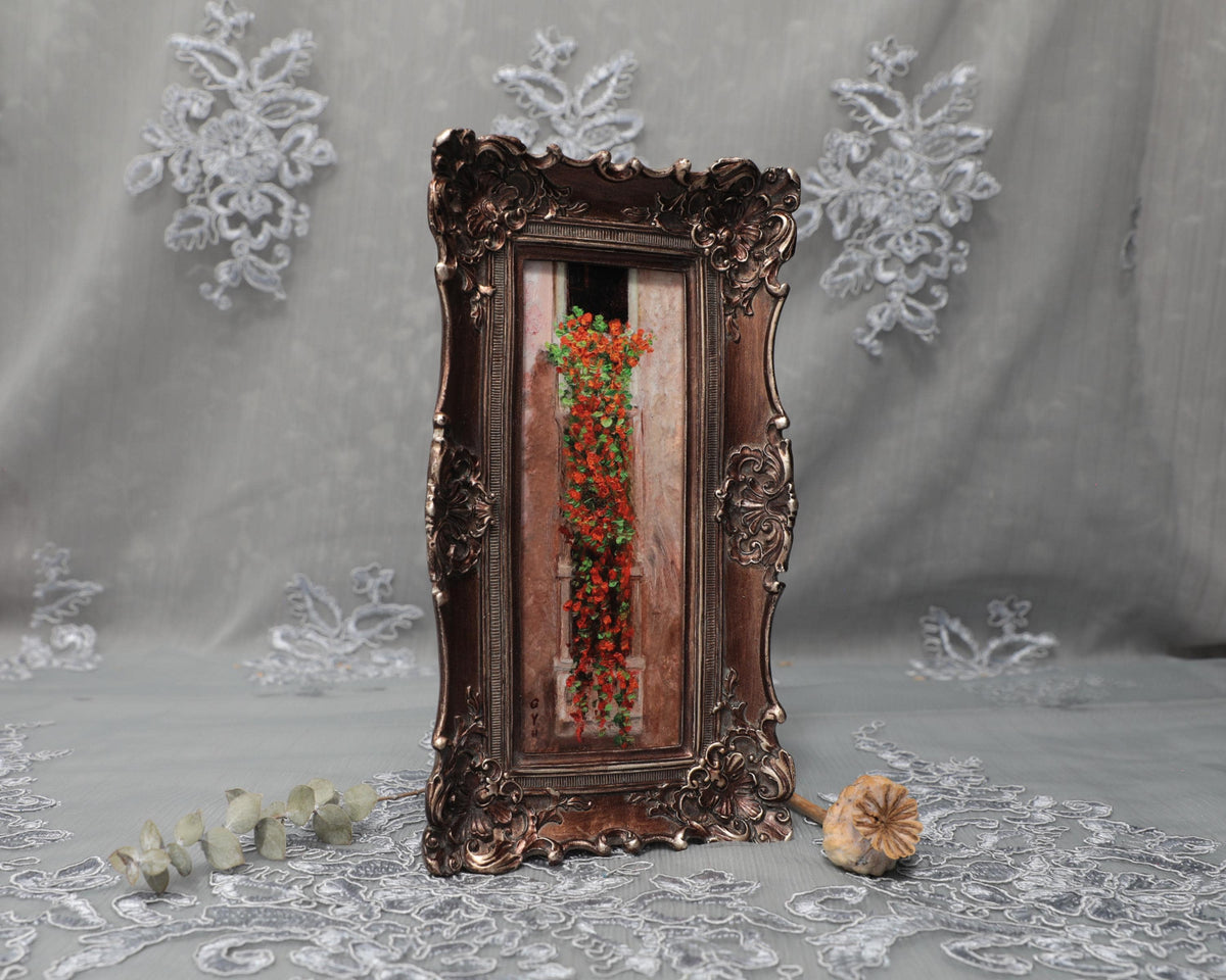 Side angle of long bronze frame with cascading nasturtium print