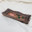 Original pink rose oil painting in an long narrow gilt frame on cream linen, side view