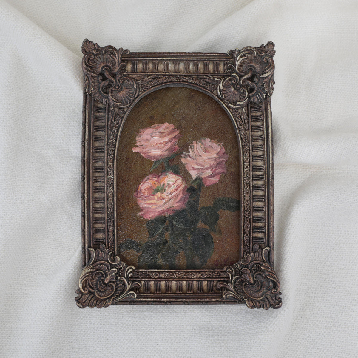 Original pink rose oil painting in arch gilt frame on cream linen