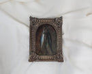 Small framed fish painting in an arched frame with fluted sides and shell corner details