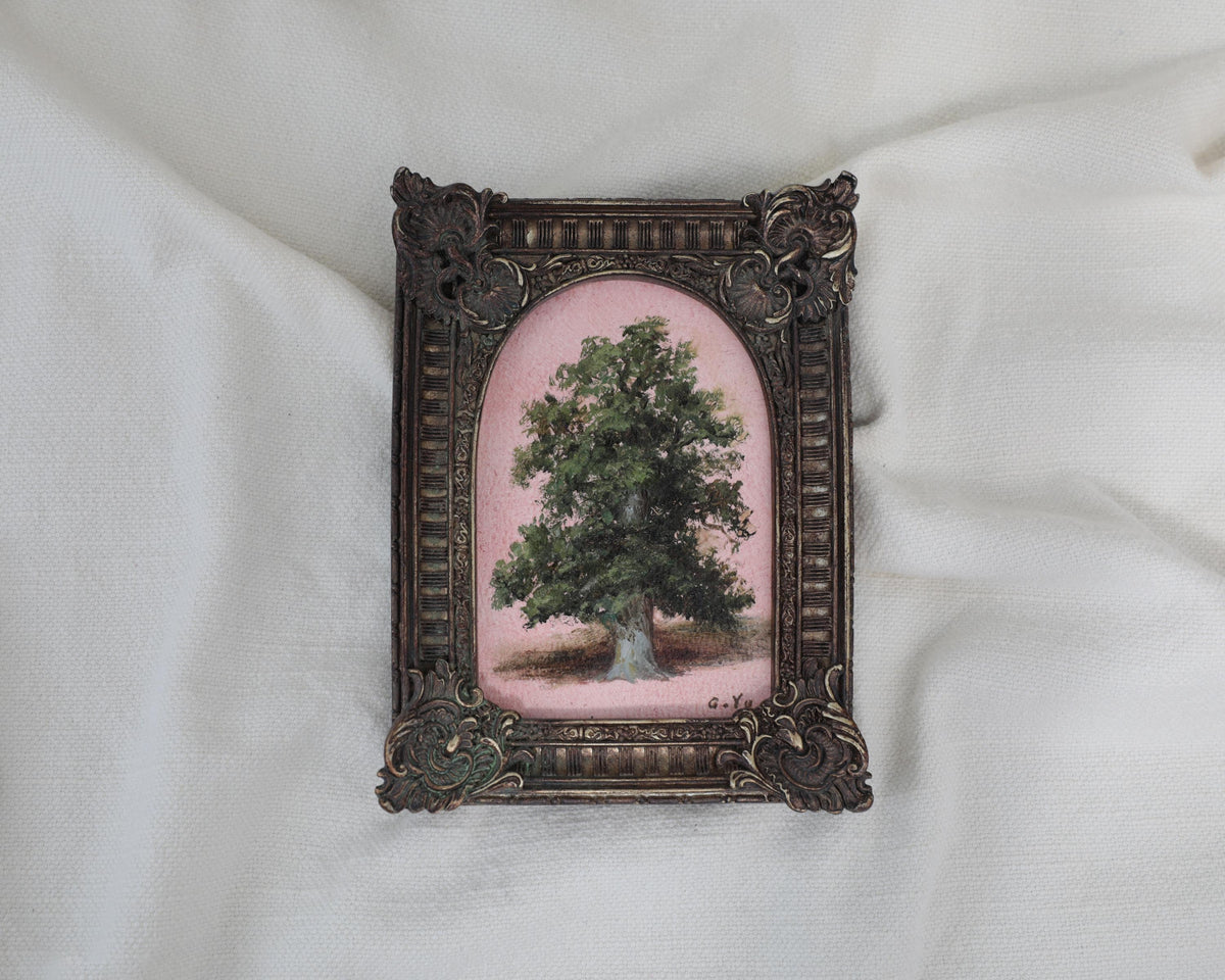 Small framed tree painting in an arched frame with fluted sides and shell corner details
